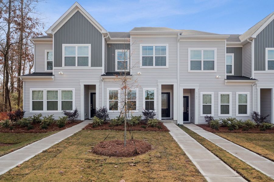 Front exterior of a new home in Lakeview Village, Charlotte, NC, highlighting curb appeal (Image 1). Front exterior of a new home in Lakeview Village, Charlotte, NC, highlighting curb appeal (Image 1).