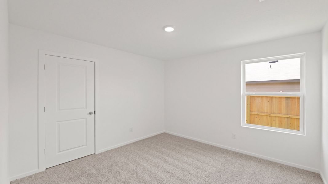 Representative unfurnished interior of a home built from the Estero by D.R. Horton in Lake Conroe Cove, Willis (Image 21). Representative unfurnished interior of a home built from the Estero by D.R. Horton in Lake Conroe Cove, Willis (Image 21).