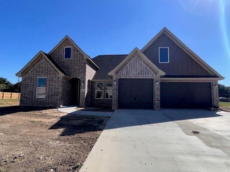 Front exterior of a new home in , Beaumont, TX, highlighting curb appeal (Image 16). Front exterior of a new home in , Beaumont, TX, highlighting curb appeal (Image 16).