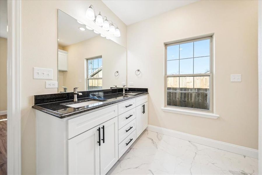 Bathroom featuring vanity