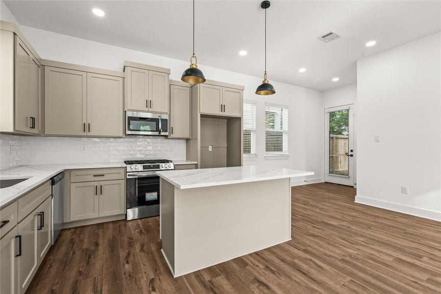 Open, intuitive, and highly functional. The strategic layout positions everything perfectly, leading right out to your private backyard oasis.