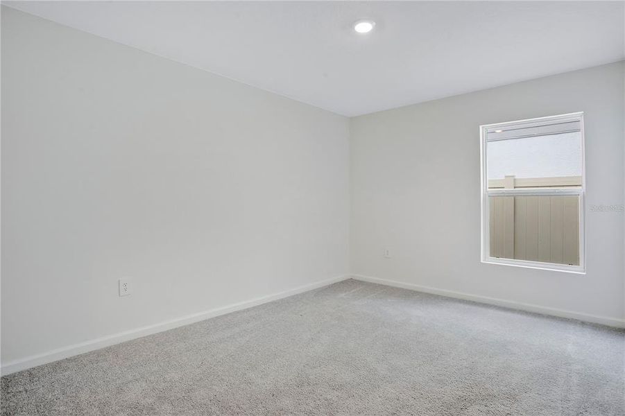 Spacious, unfurnished interior of a new home in Peace Creek Reserve, Winter Haven (Image 17).