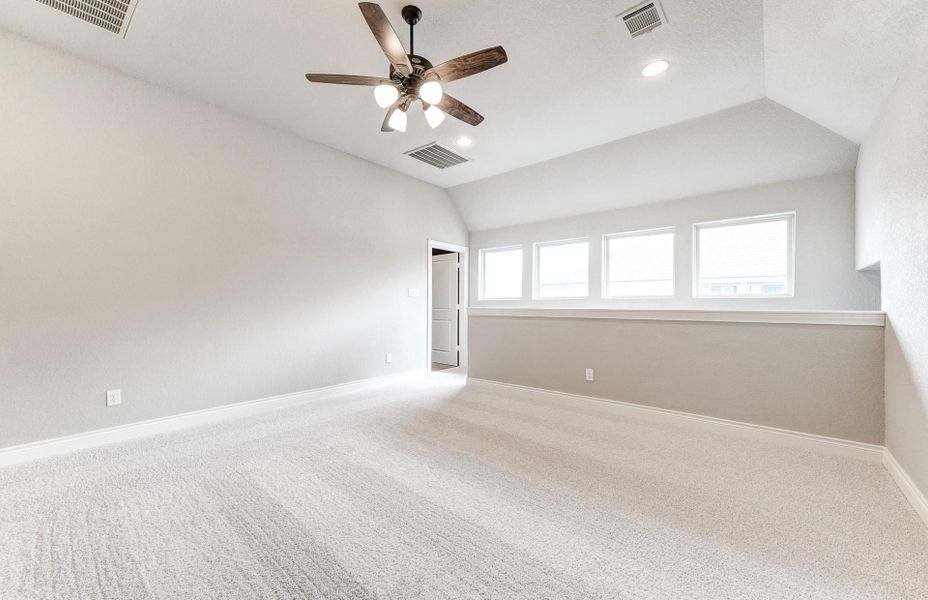 Spacious, unfurnished interior of a new home in The Woodlands Hills 65′, Willis (Image 43).