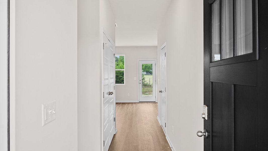 Representative unfurnished interior of a home built from the Edgewood Express - Duplex by D.R. Horton in Remington Chase, Perry (Image 10).