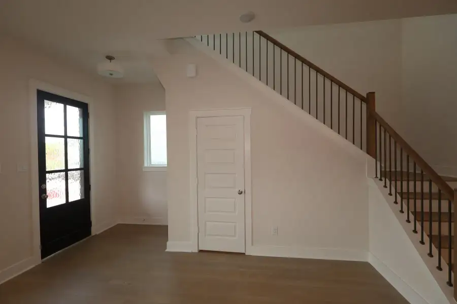 Spacious, unfurnished interior of a new home in Bridgeland Central: Emerald Heights - Cottages Row Collection, Cypress (Image 8). Spacious, unfurnished interior of a new home in Bridgeland Central: Emerald Heights - Cottages Row Collection, Cypress (Image 8).