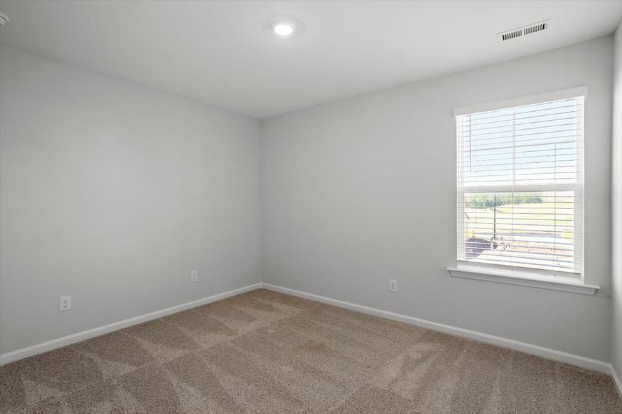 Spacious, unfurnished interior of a new home in Sweetbrier, Durham (Image 34).