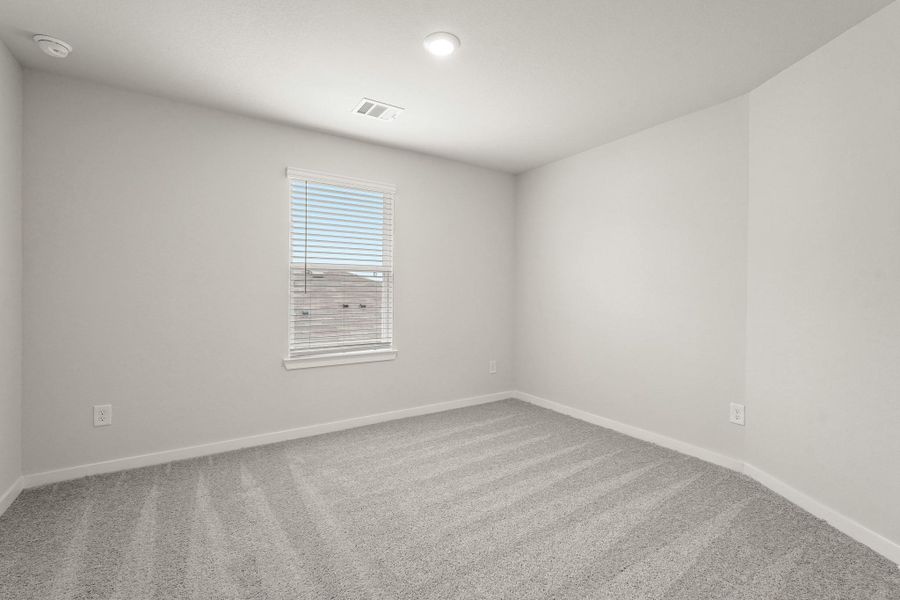 Spacious, unfurnished interior of a new home in Paloma at Sanford Farms, Waller (Image 11).