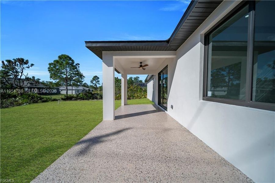 Exterior details and patio area of a home in , Lehigh Acres (Image 4).