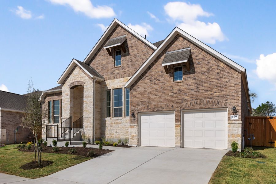 Representative exterior photo of a completed home built from the Maxwell by Ashton Woods in The Estates at La Cima, San Marcos, TX (Image 26). Representative exterior photo of a completed home built from the Maxwell by Ashton Woods in The Estates at La Cima, San Marcos, TX (Image 26).