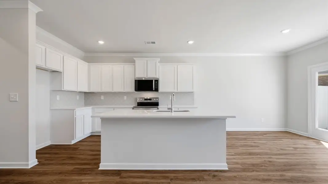 Furnished interior view inside a new home in Independence Villas and Townhomes, Loganville (Image 5).