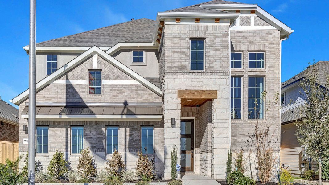 Representative exterior photo of a completed home built from the Tahiti by DRB Homes in Briarwood, Elgin, TX (Image 18). Representative exterior photo of a completed home built from the Tahiti by DRB Homes in Briarwood, Elgin, TX (Image 18).