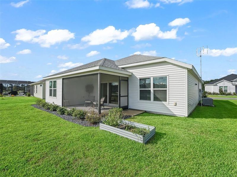 Front exterior of a new home in , The Villages, FL, highlighting curb appeal (Image 19).
