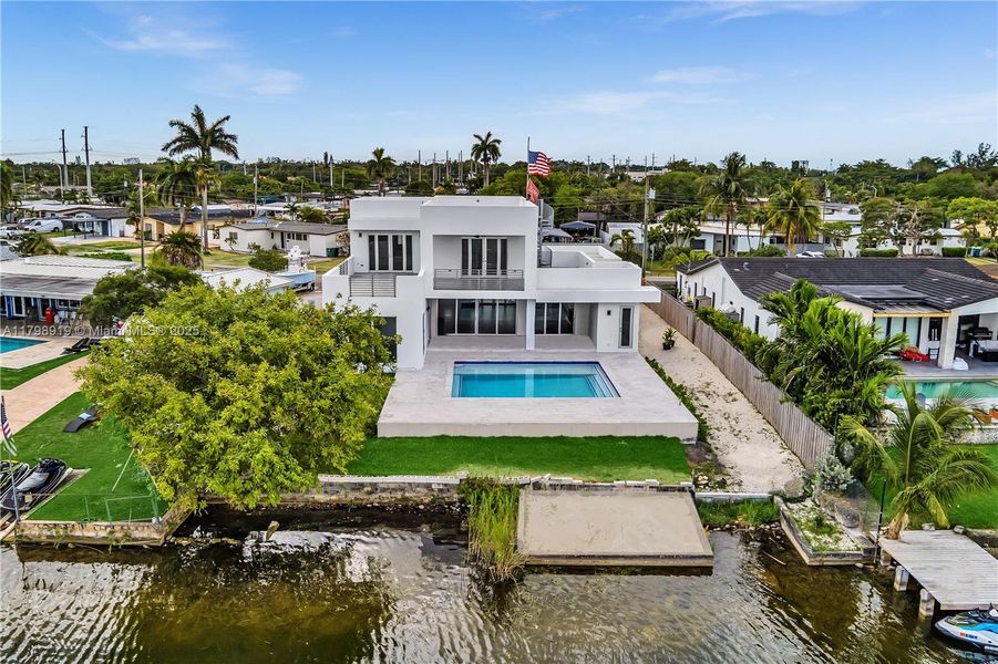 Front exterior of a new home in , Miami, FL, highlighting curb appeal (Image 15).