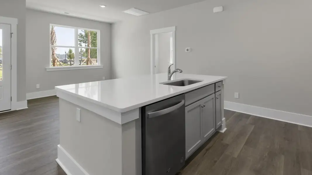 Furnished interior view inside a new home in The Retreat at Indigo Preserve Townhomes, Leland (Image 6).