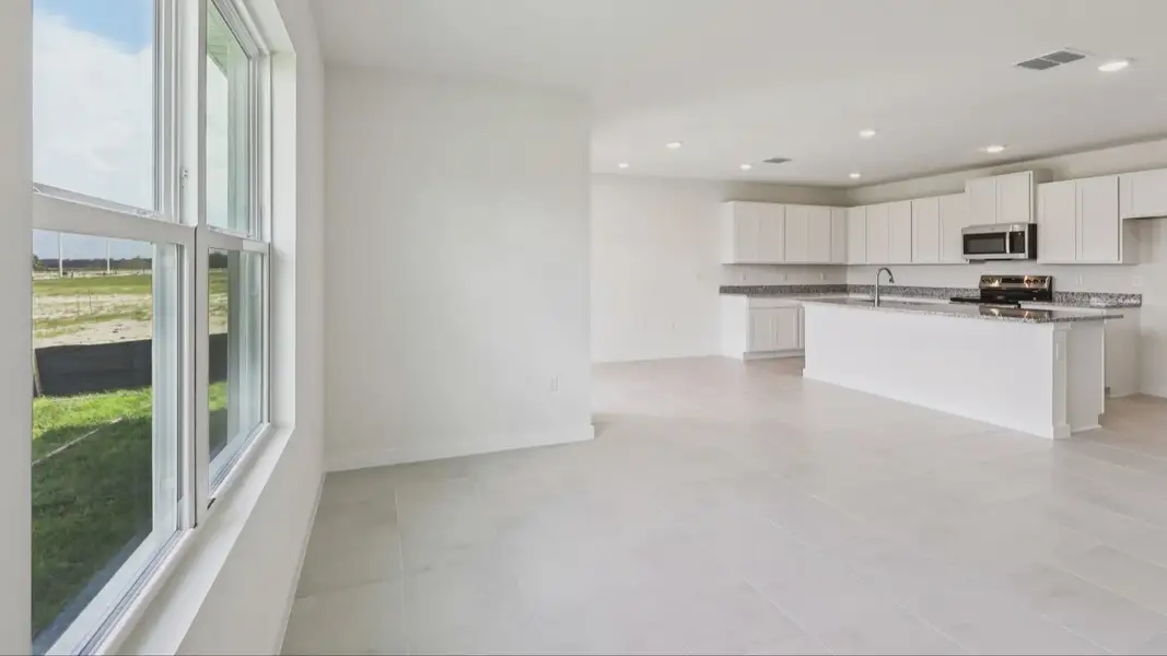 Furnished interior view inside a new home in Willowbrook North, Winter Haven (Image 6).