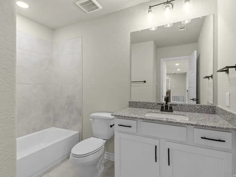 Furnished interior view inside a new home in The Reserve at Potranco Oaks, Castroville (Image 19).