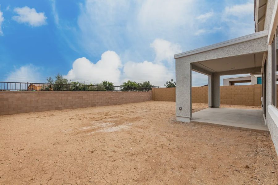 Exterior details and patio area of a home in Avanti at Granite Vista, Waddell (Image 3).