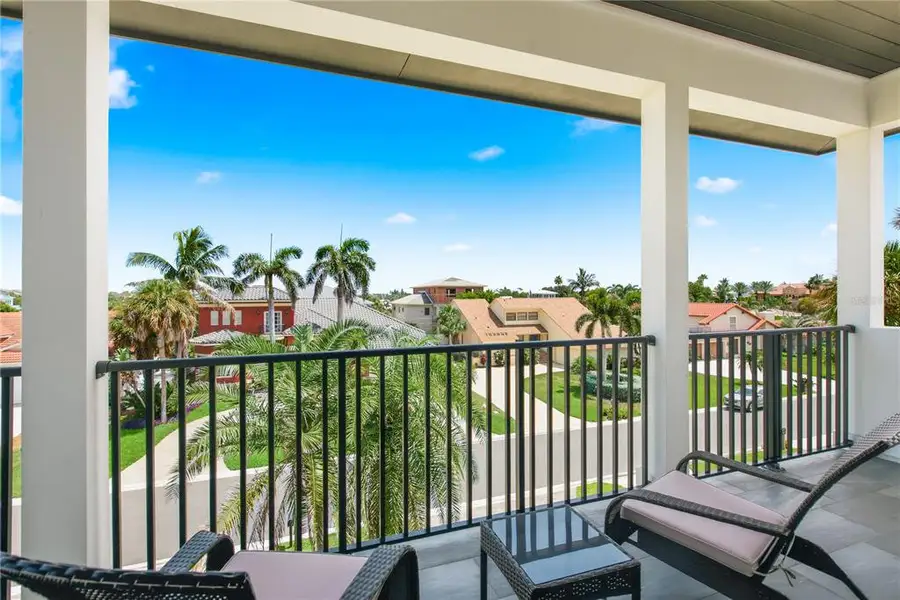 Exterior details and patio area of a home in , Belleair Beach (Image 3).