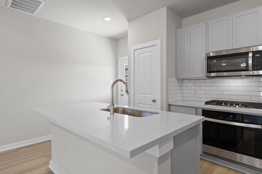 Furnished interior view inside a new home in Westridge Cove, Conroe (Image 10).