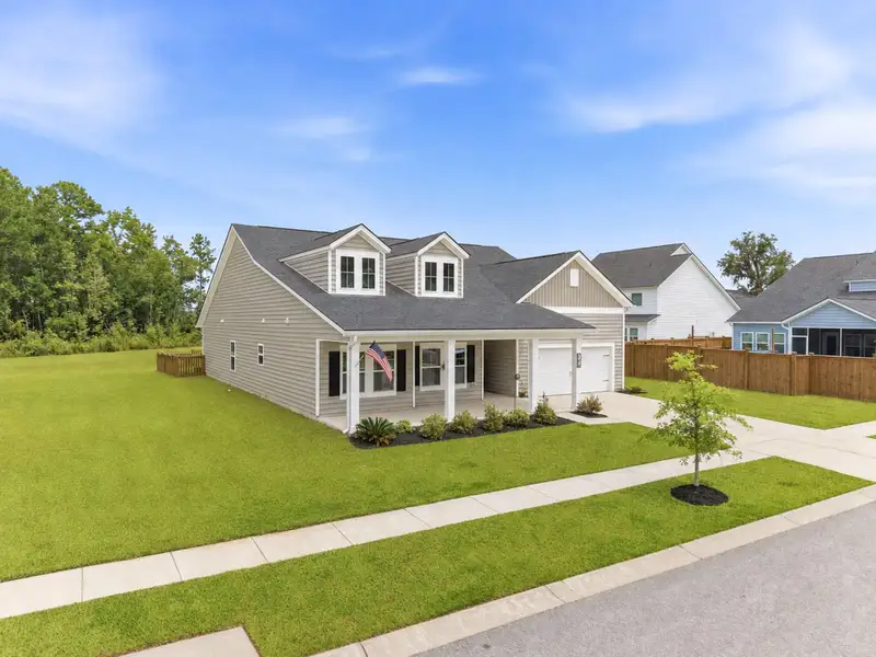 Front exterior of a new home in , Summerville, SC, highlighting curb appeal (Image 28).