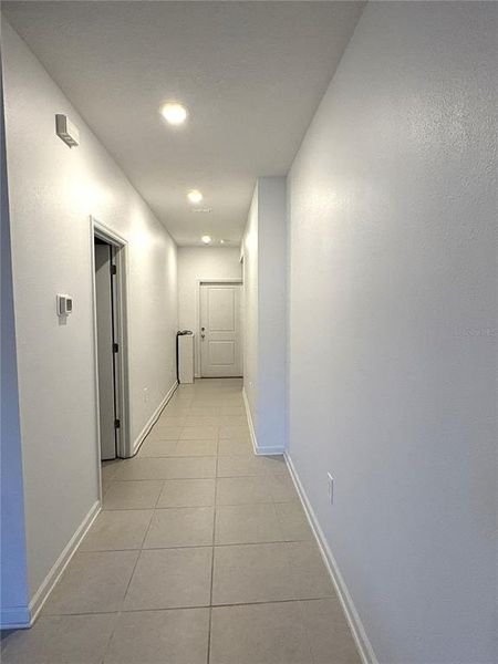 Spacious, unfurnished interior of a new home in Peace Creek Reserve: Grand Collection, Winter Haven (Image 16).