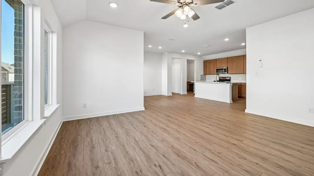 Furnished interior view inside a new home in Flora, Hutto (Image 11).