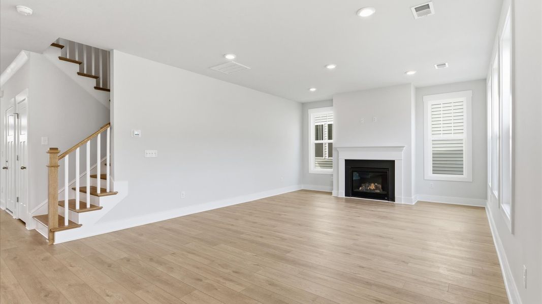 Vibrant and welcoming family room anchored by clean lines, tasteful materials, and abundant light located in Gray Court, SC