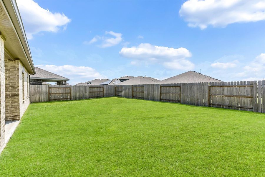 Exterior details and patio area of a home in Sunterra, Katy (Image 20). Exterior details and patio area of a home in Sunterra, Katy (Image 20).