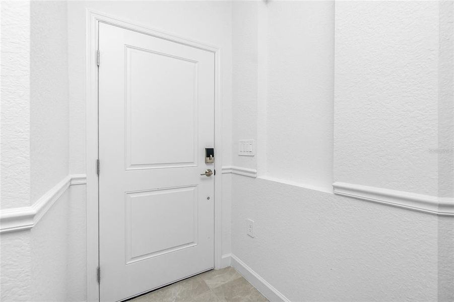 Spacious, unfurnished interior of a new home in Island Lakes at Coco Bay: Villas, Englewood (Image 18).