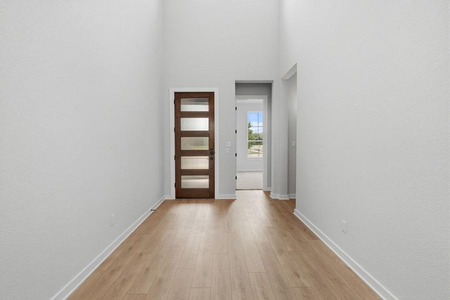 Spacious, unfurnished interior of a new home in Heritage, Dripping Springs (Image 35).