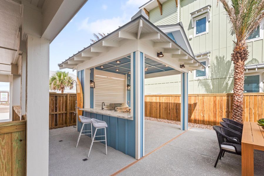 View of patio featuring a gazebo and an outdoor kitchen View of patio featuring a gazebo and an outdoor kitchen