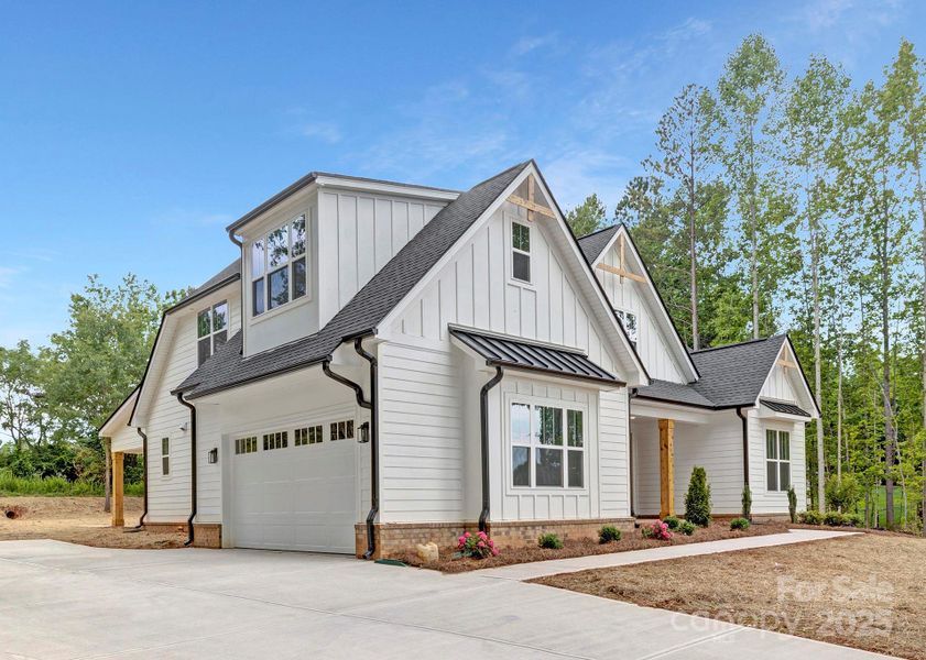 Front exterior of a new home in , Clover, SC, highlighting curb appeal (Image 26). Front exterior of a new home in , Clover, SC, highlighting curb appeal (Image 26).