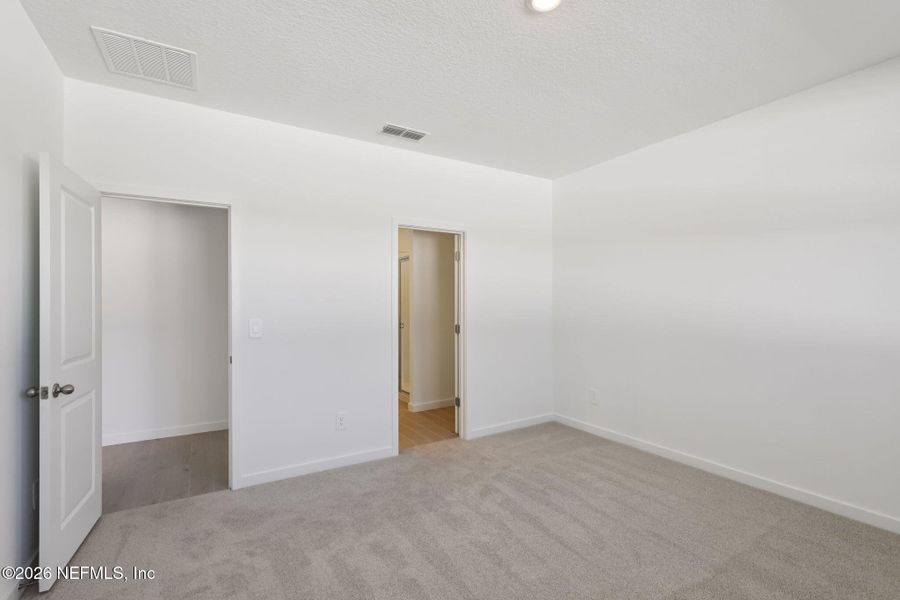 Spacious, unfurnished interior of a new home in Flagler Village - Signature Series, Palm Coast (Image 23).