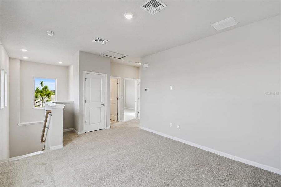 Spacious, unfurnished interior of a new home in Weslyn Park in Sunbridge 34', St. Cloud (Image 37).