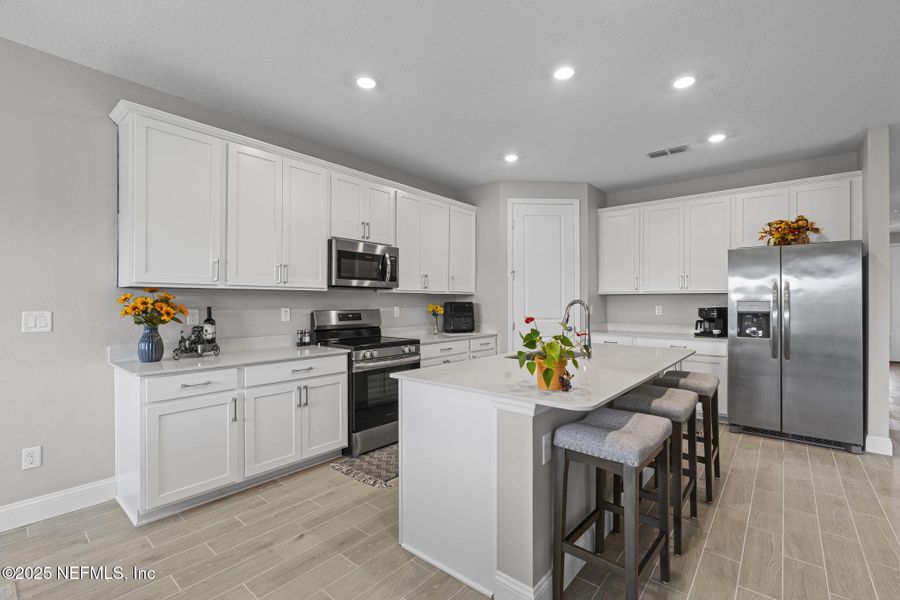 Furnished interior view inside a new home in Edenbrooke at Hyland Trail | 55+: Edenbrooke at Hyland Trail 60s, Green Cove Springs (Image 38). Furnished interior view inside a new home in Edenbrooke at Hyland Trail | 55+: Edenbrooke at Hyland Trail 60s, Green Cove Springs (Image 38).