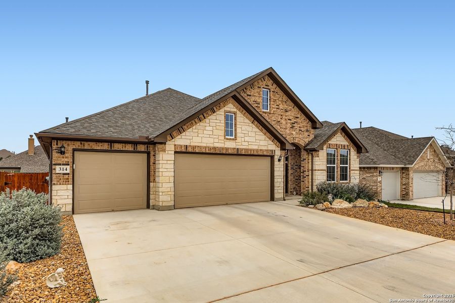 Front exterior of a new home in , Spring Branch, TX, highlighting curb appeal (Image 21).