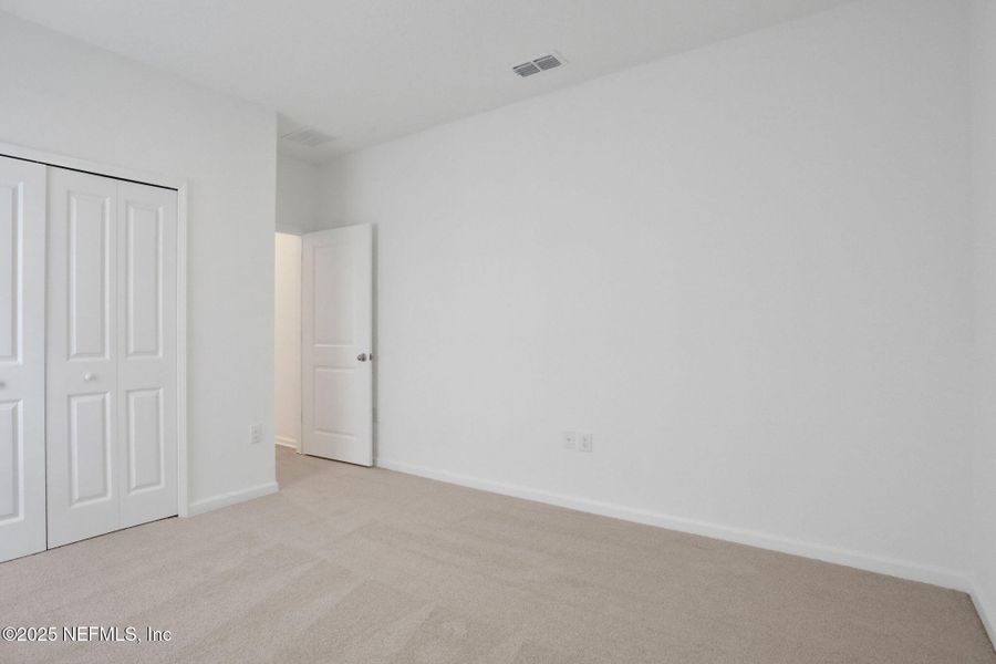 Spacious, unfurnished interior of a new home in TrailMark, St. Augustine (Image 14). Spacious, unfurnished interior of a new home in TrailMark, St. Augustine (Image 14).