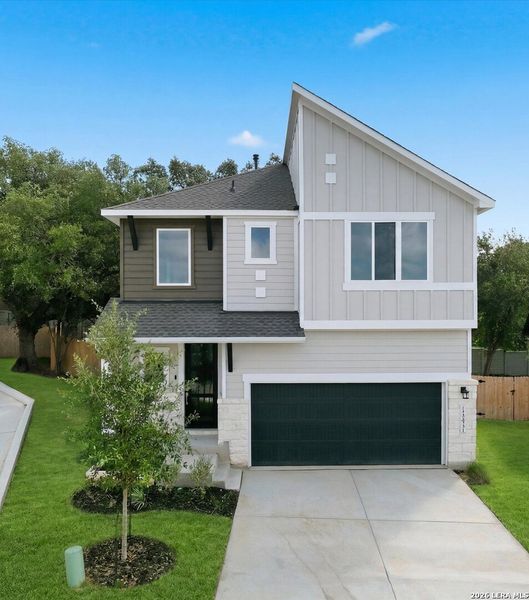 Front exterior of a new home in Park Hill Commons, San Antonio, TX, highlighting curb appeal (Image 1). Front exterior of a new home in Park Hill Commons, San Antonio, TX, highlighting curb appeal (Image 1).