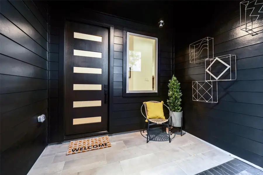 Exterior details and patio area of a home in , Houston (Image 2).