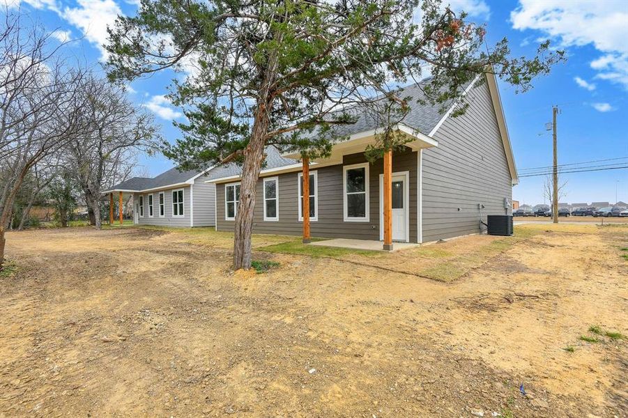 View of front of house with a patio area