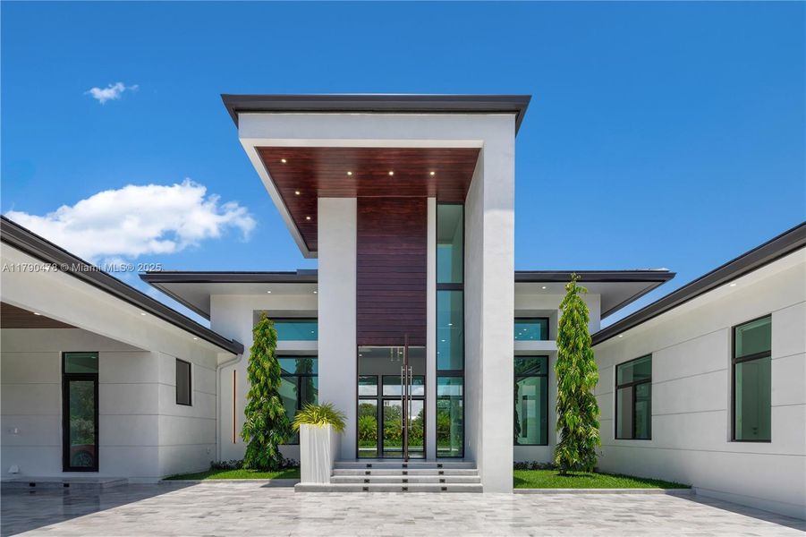 Front exterior of a new home in , Plantation, FL, highlighting curb appeal (Image 23).