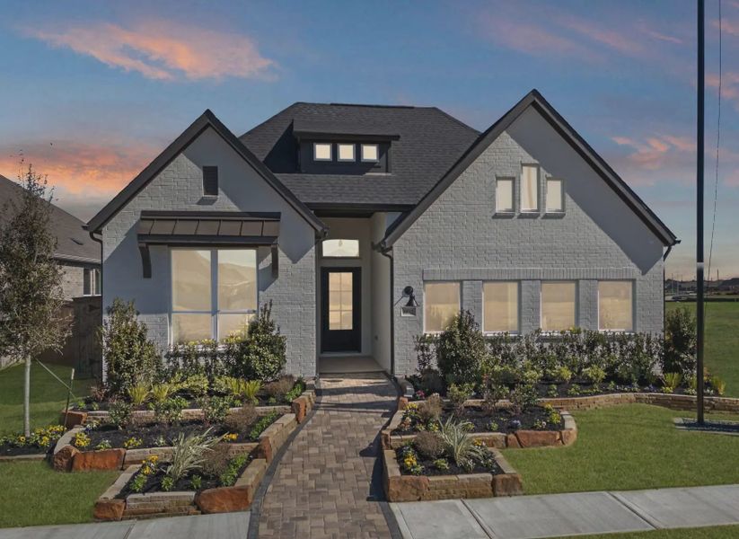 Representative exterior photo of a completed home built from the Hampton by Chesmar Homes in University Heights, McKinney, TX (Image 1). Representative exterior photo of a completed home built from the Hampton by Chesmar Homes in University Heights, McKinney, TX (Image 1).