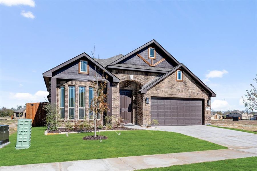Front exterior of a new home in Georgetown at Kings Fort 50s, Kaufman, TX, highlighting curb appeal (Image 1).