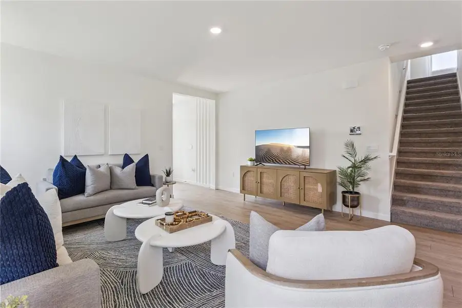 Furnished interior view inside a new home in Crossroads at Kelly Park, Apopka (Image 13).