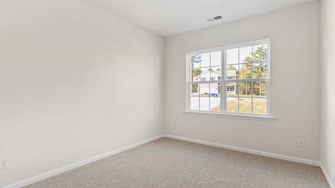 Representative unfurnished interior of a home built from the Booth by D.R. Horton in River Stone, Elm City (Image 10).