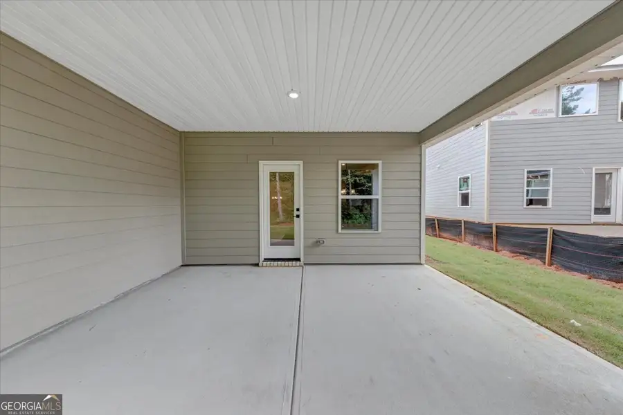 Exterior details and patio area of a home in Canterbury Villas, Carrollton (Image 3). Exterior details and patio area of a home in Canterbury Villas, Carrollton (Image 3).