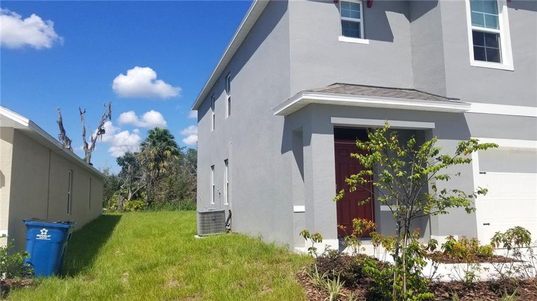 Exterior details and patio area of a home in Charles Cove, Davenport (Image 2). Exterior details and patio area of a home in Charles Cove, Davenport (Image 2).