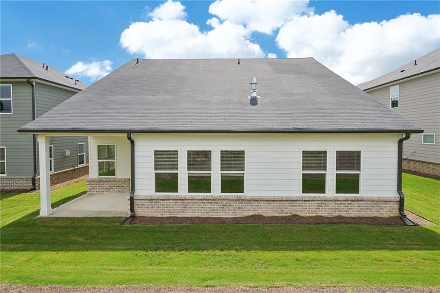 Front exterior of a new home in Martin Springs - Estate Series, Lawrenceville, GA, highlighting curb appeal (Image 2). Front exterior of a new home in Martin Springs - Estate Series, Lawrenceville, GA, highlighting curb appeal (Image 2).