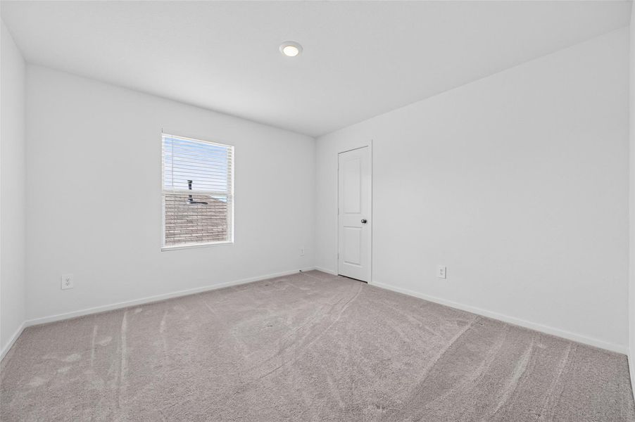 Secondary bedroom has carpet. Secondary bedroom has carpet.