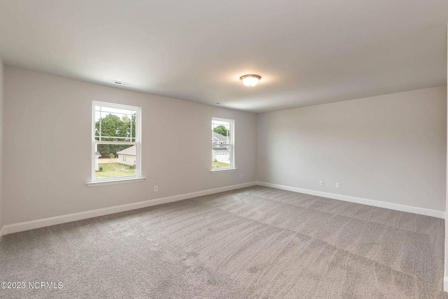 Representative unfurnished interior of a home built from the 3105 by Adams Homes in Parkland Place, Pace (Image 29).